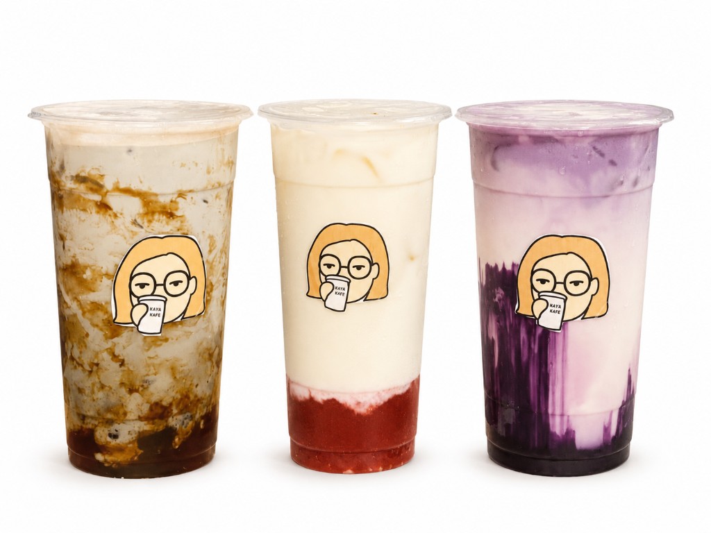 Three Haya Kape iced drinks — brown sugar milk tea, strawberry milk, and taro milk